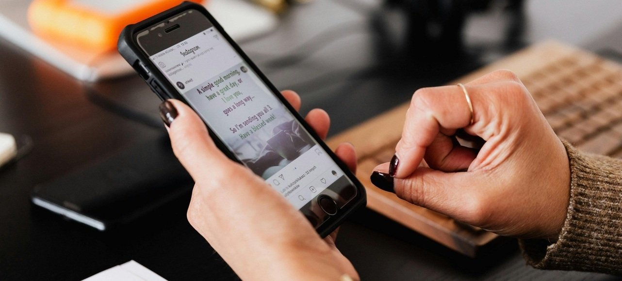 Person browsing inspirational messages and greeting ideas on a smartphone