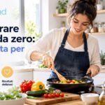 Principiante che taglia carote e cipolle su un tagliere di legno per preparare un soffritto